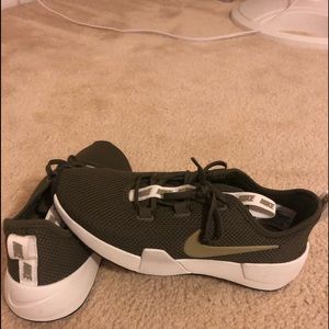 Olive Nike tennis shoes